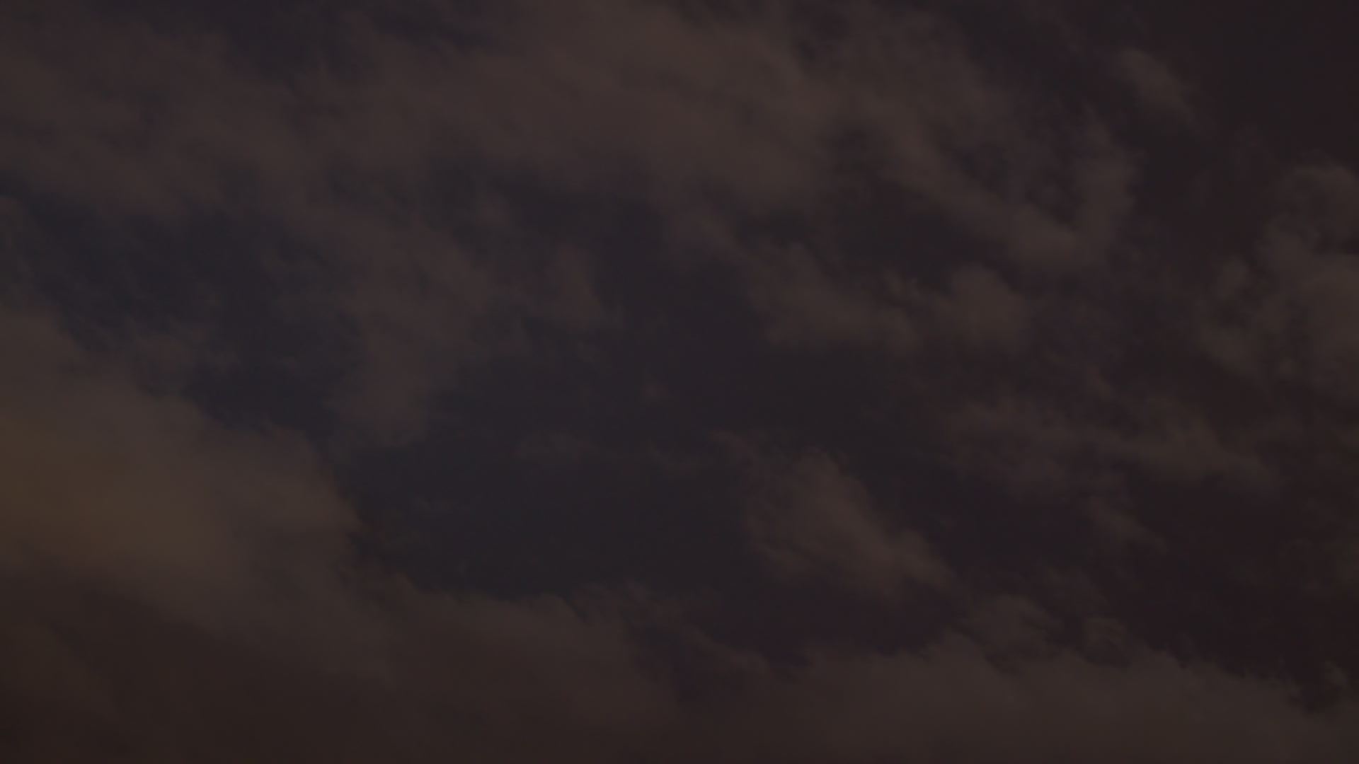 Continuous lightning flashes above stratus clouds at night, time-lapse, HD. Camera: Netflix-approved Sony FS7.