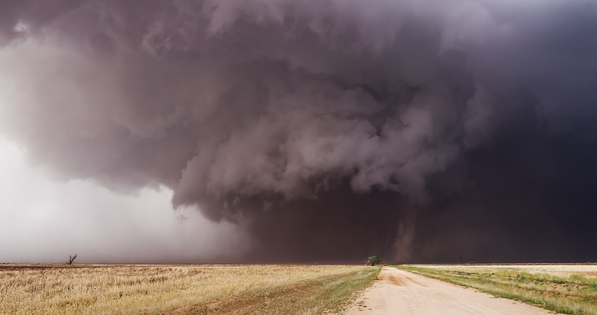 Texas Tornado - Big, dusty wedge tornado moves over road, satellite tornado, 4K. Cinematographer: Martin Lisius.
