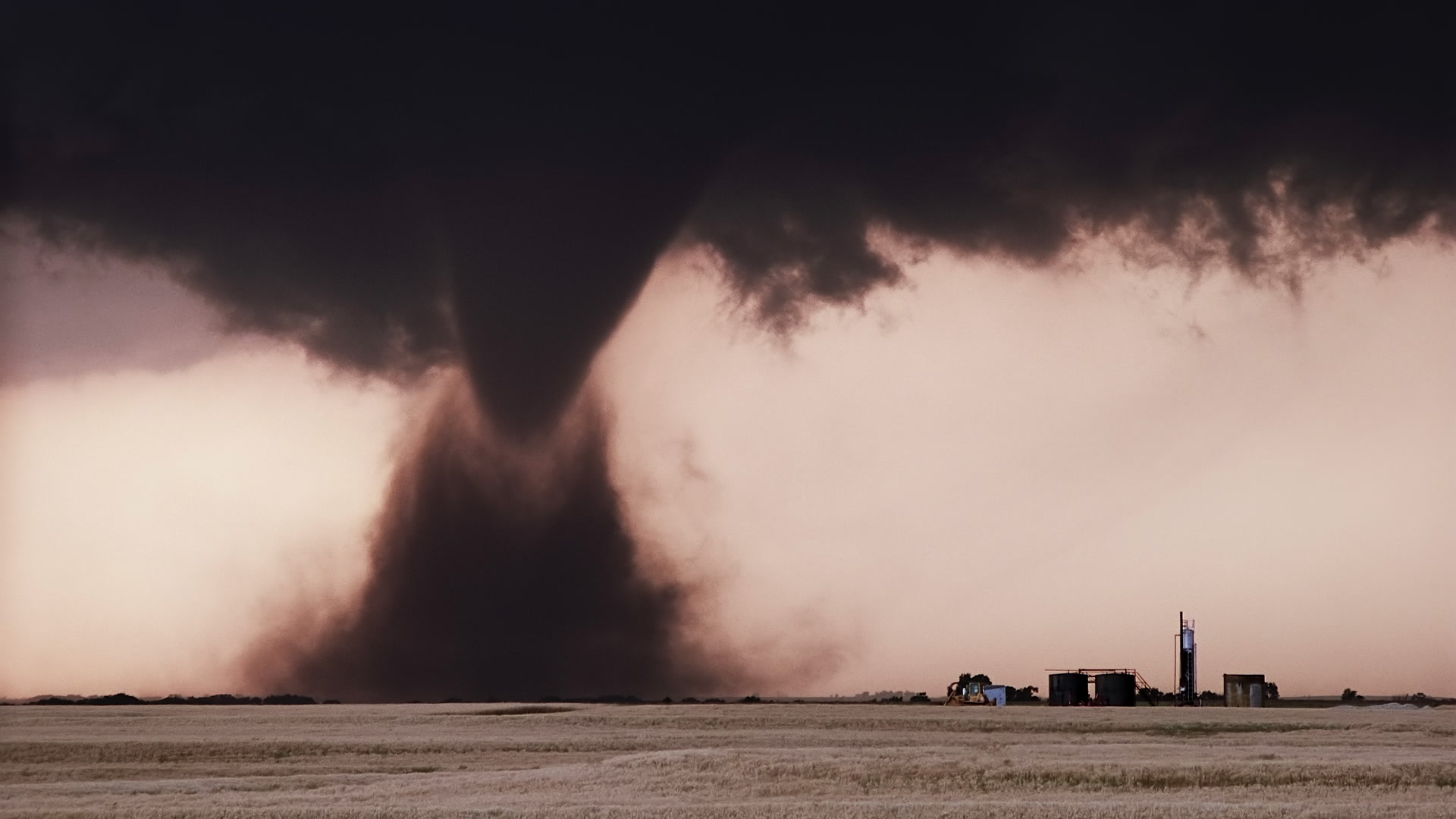 Storms on 35 - Cone tornado approaches farm, Kansas. Super 35mm film to 4K video. Cinematographer: Martin Lisius. Need more? Give us a shout!