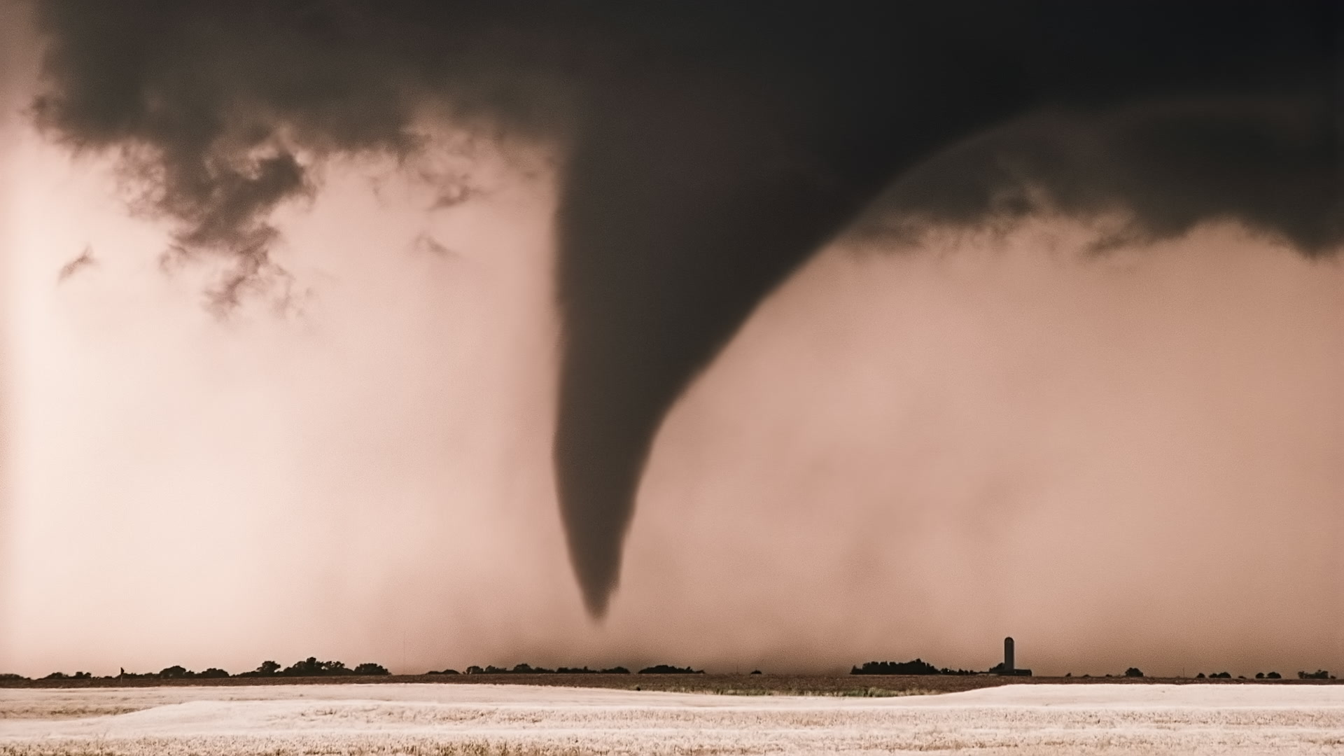 Storms on 35 - Big tornado approaches farm, Kansas. Super 35mm film to 4K video. Cinematographer: Martin Lisius. Need more? Give us a shout!