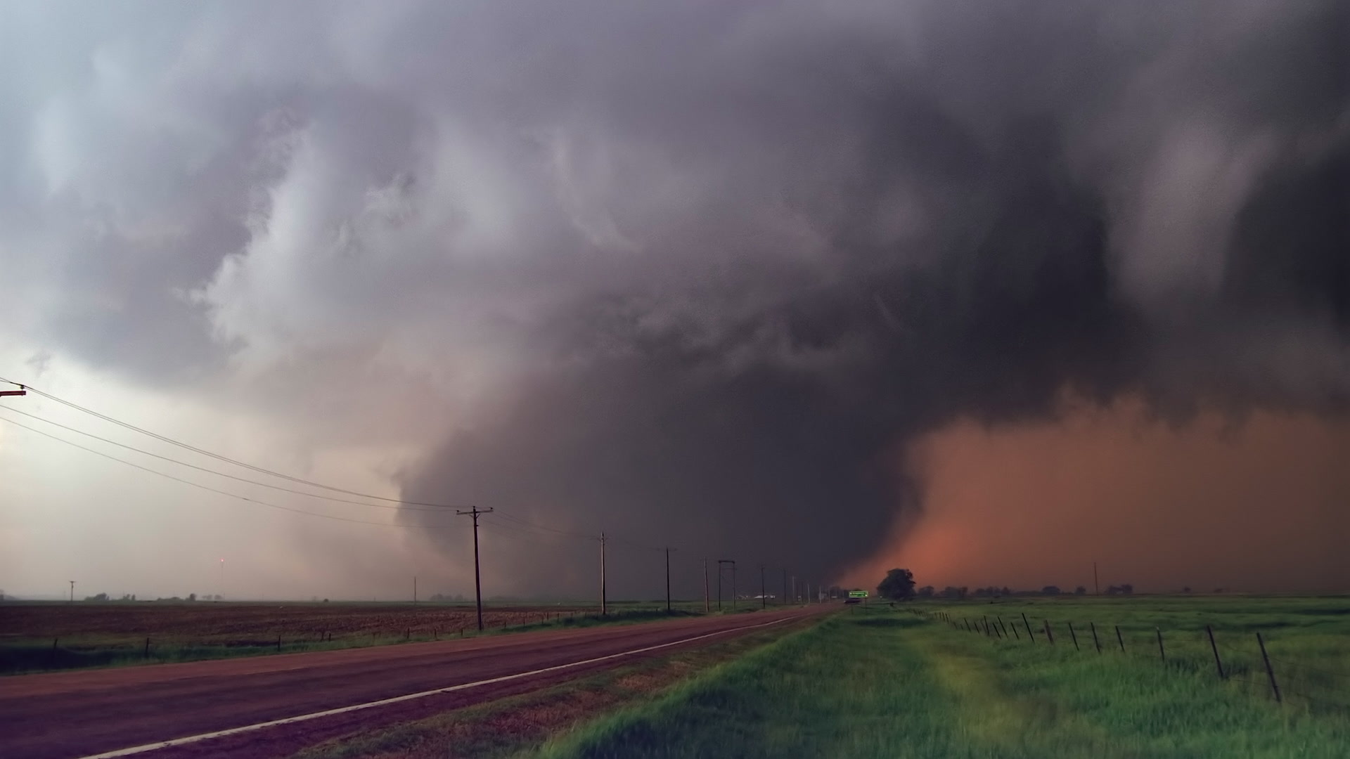 Storms on 35 - Spencer, South Dakota tornado crosses highway. Super 35mm film to 4K video. Cinematographer: Martin Lisius. Need more? Give us a shout!