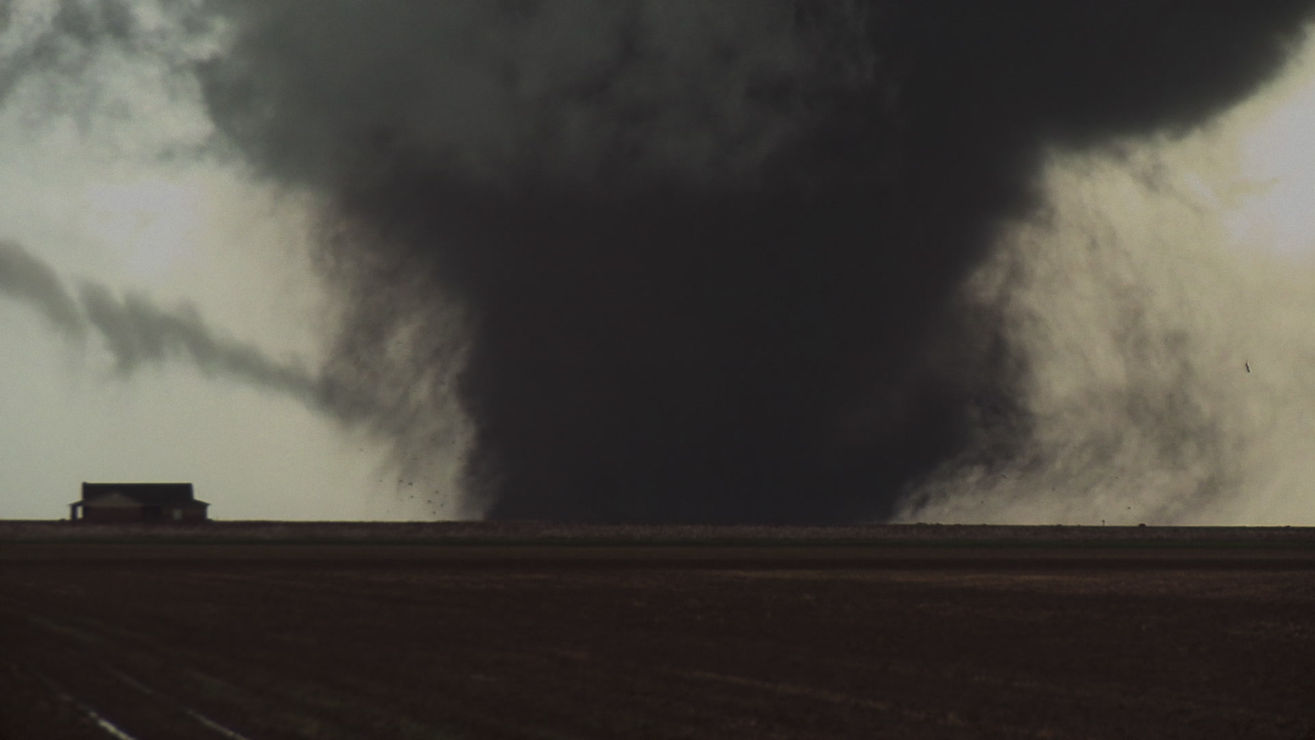 Oklahoma Tornado - Dark wedge tornado, lightning, house, 4K. Cinematographer: Martin Lisius.