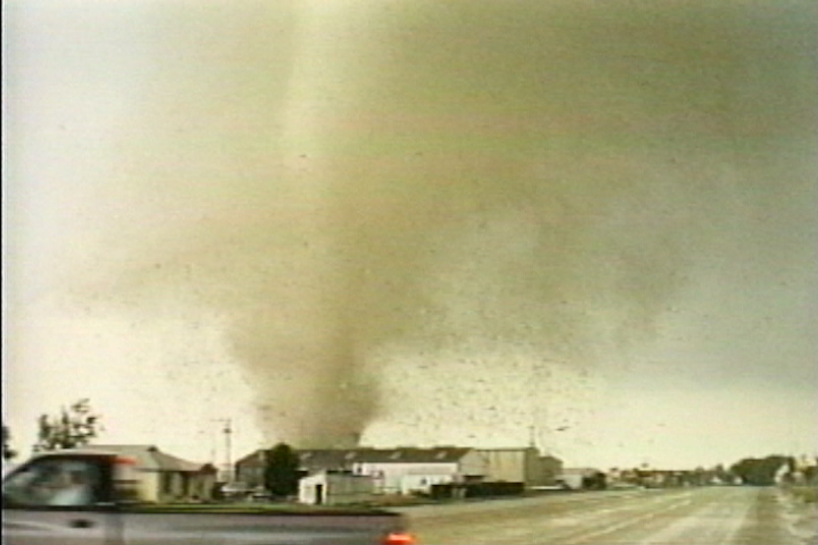 Pampa, Texas tornado tracks over houses, toward street, looking north.