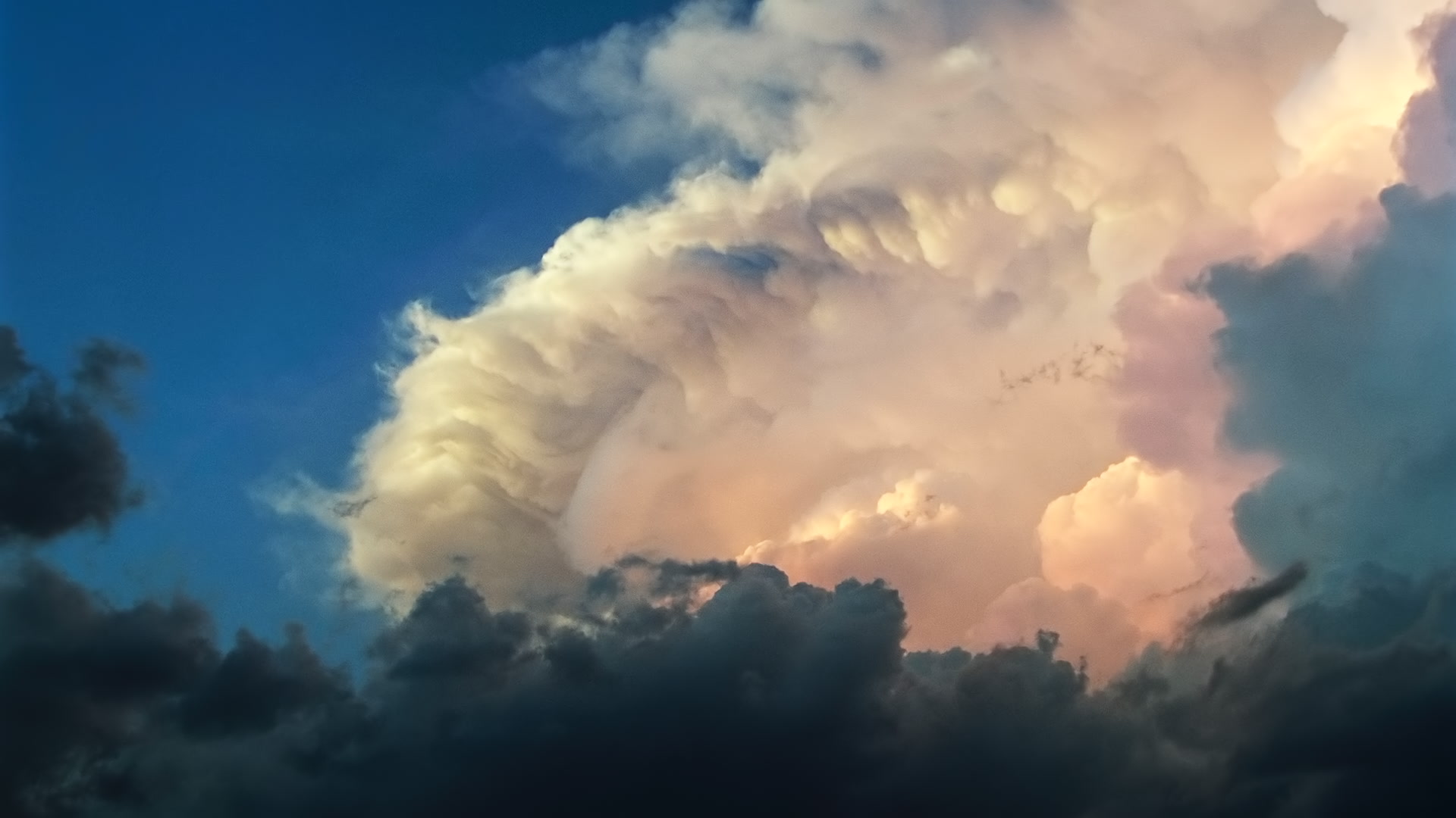 Storms on 35 - Big, colorful thunderstorm at sunset, El Reno, Oklahoma. Super 35mm film to 4K video. Cinematographer: Martin Lisius. Need more? Give us a shout!