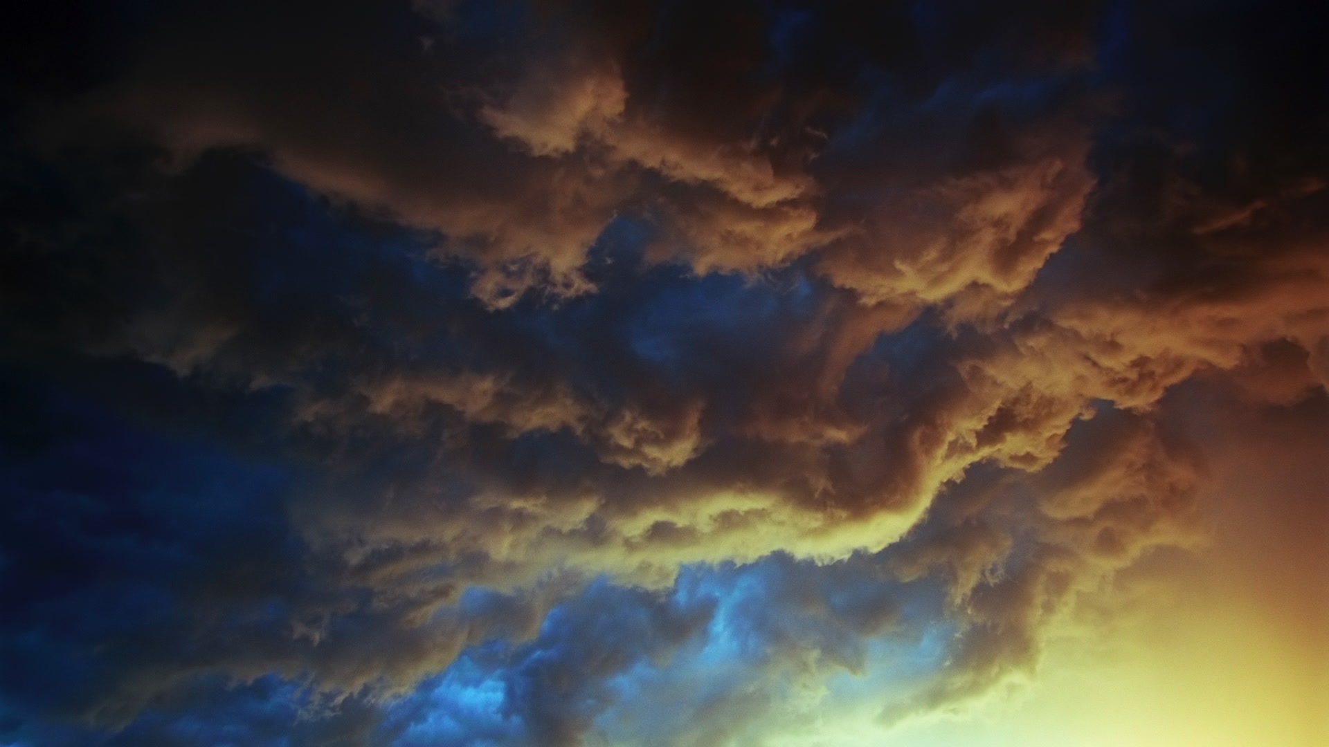 Storms on 35 - Inky orange and teal storm clouds with lightning. Super 35mm film to 4K video. Cinematographer: Martin Lisius. Need more? Give us a shout!