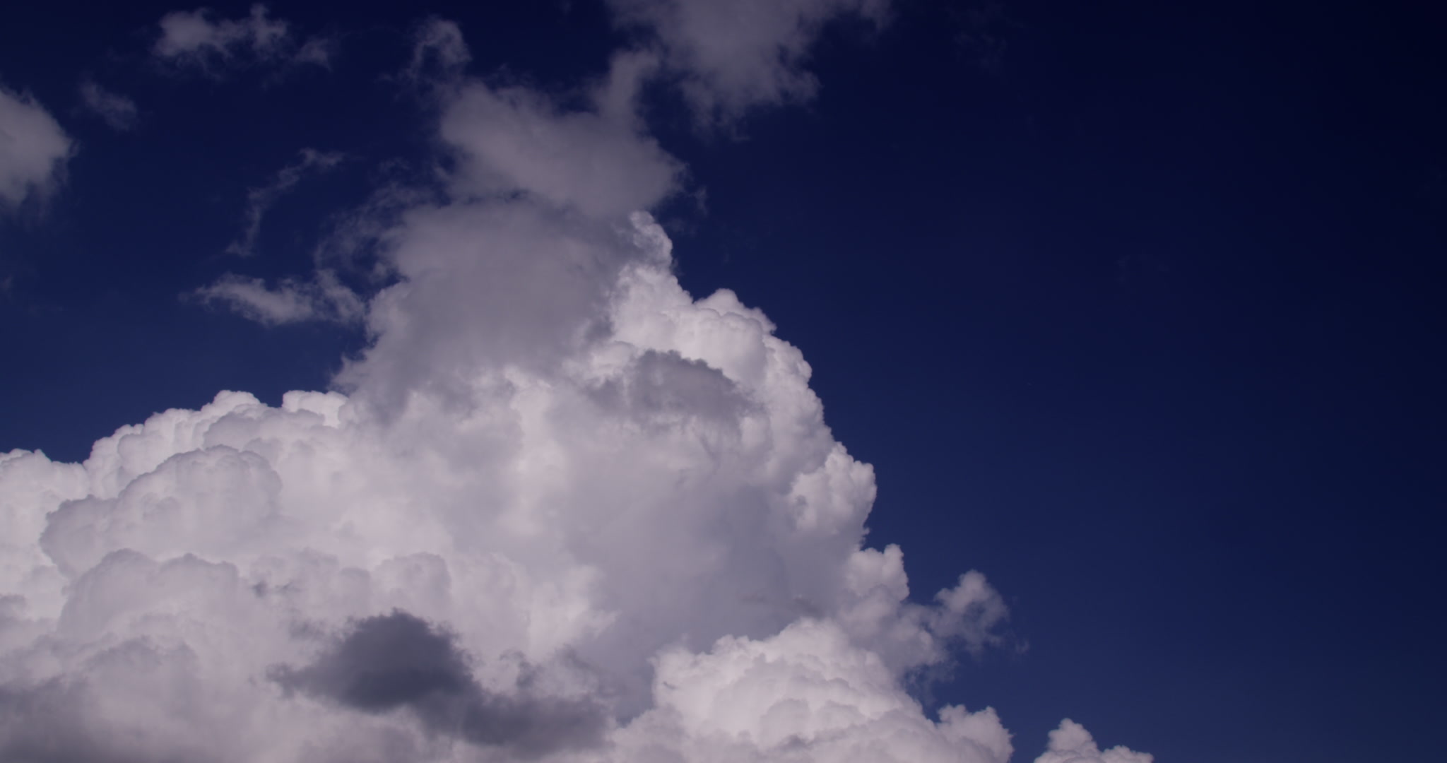 Storm clouds - Towering cumulus cloud and blue sky, 4K. Cinematographer: Martin Lisius. DCI 4K. Need more storm shots? Contact us.