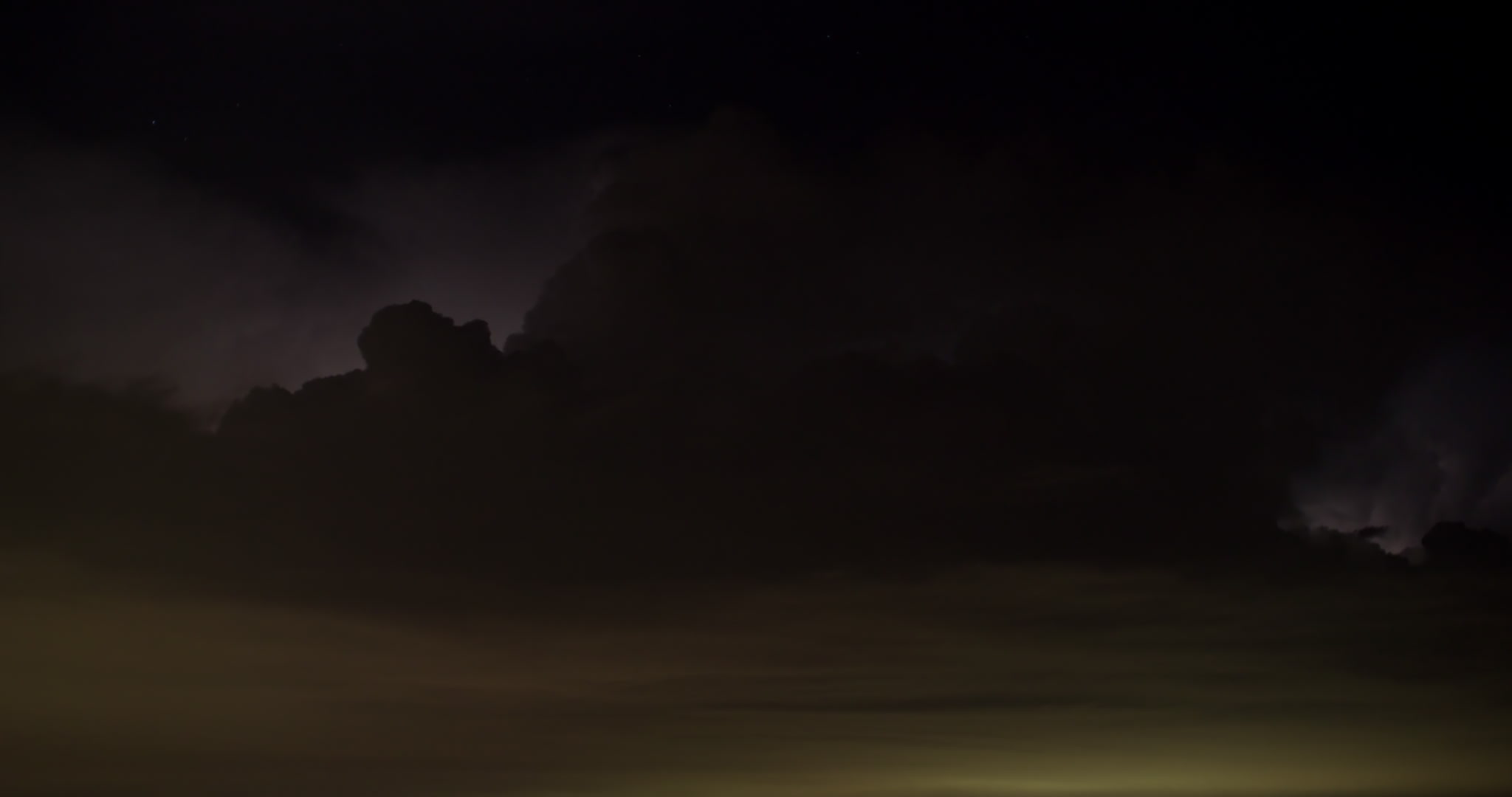 Storm clouds - Constant lightning flashes in storm at night, urban glow below, time-lapse, 4K. Cinematographer: Martin Lisius. Need more cinematic-quality storm shots? Please contact us.