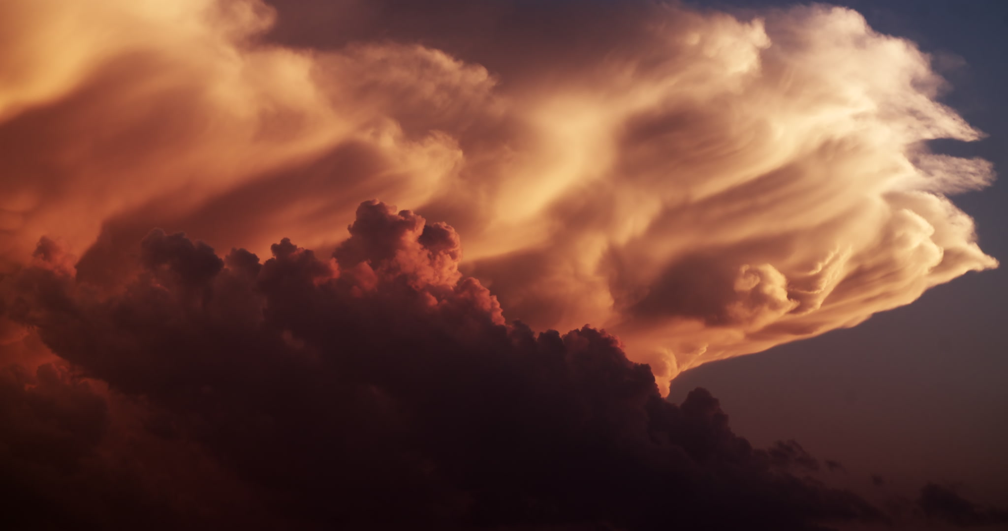 Storm clouds - Fiery orange thunderstorm at sunset, 4K. Cinematographer: Martin Lisius. Need more cinematic-quality storm shots? Please contact us.