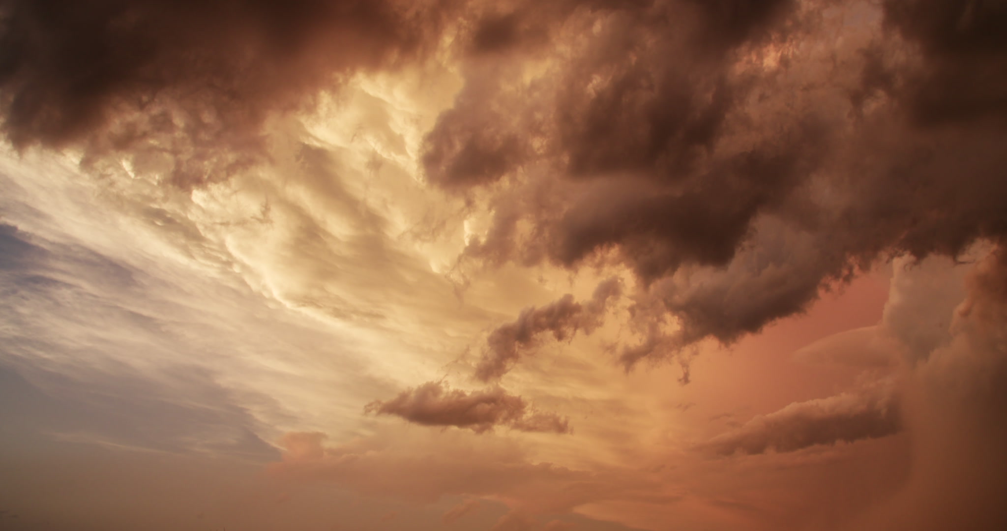 Storm clouds - Thunderstorm anvil painted gold at sunset, time-lapse, 4K. Cinematographer: Martin Lisius. Need more cinematic-quality storm shots? Please contact us.