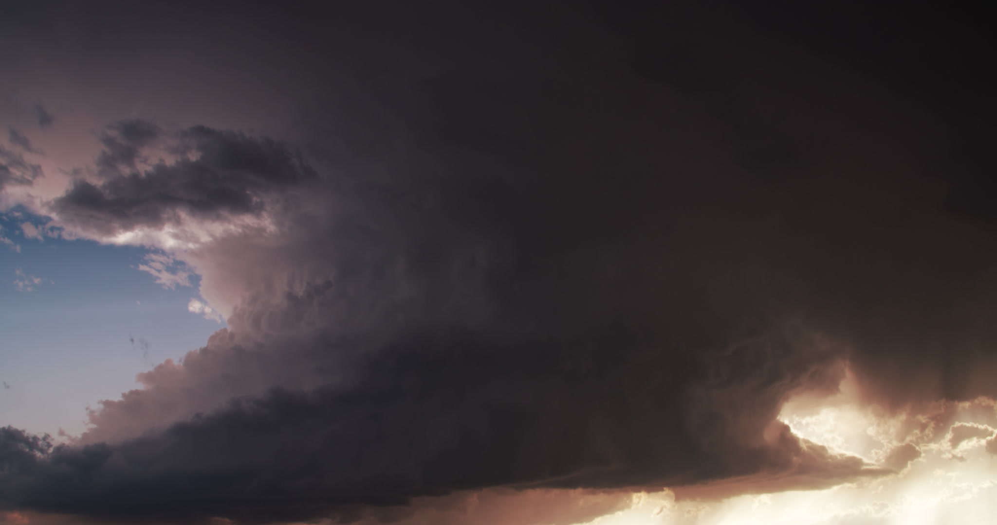 Storm clouds - Spinning supercell with lightning heads toward camera, late day, 4K. Cinematographer: Martin Lisius. Need more cinematic-quality storm shots? Please contact us.