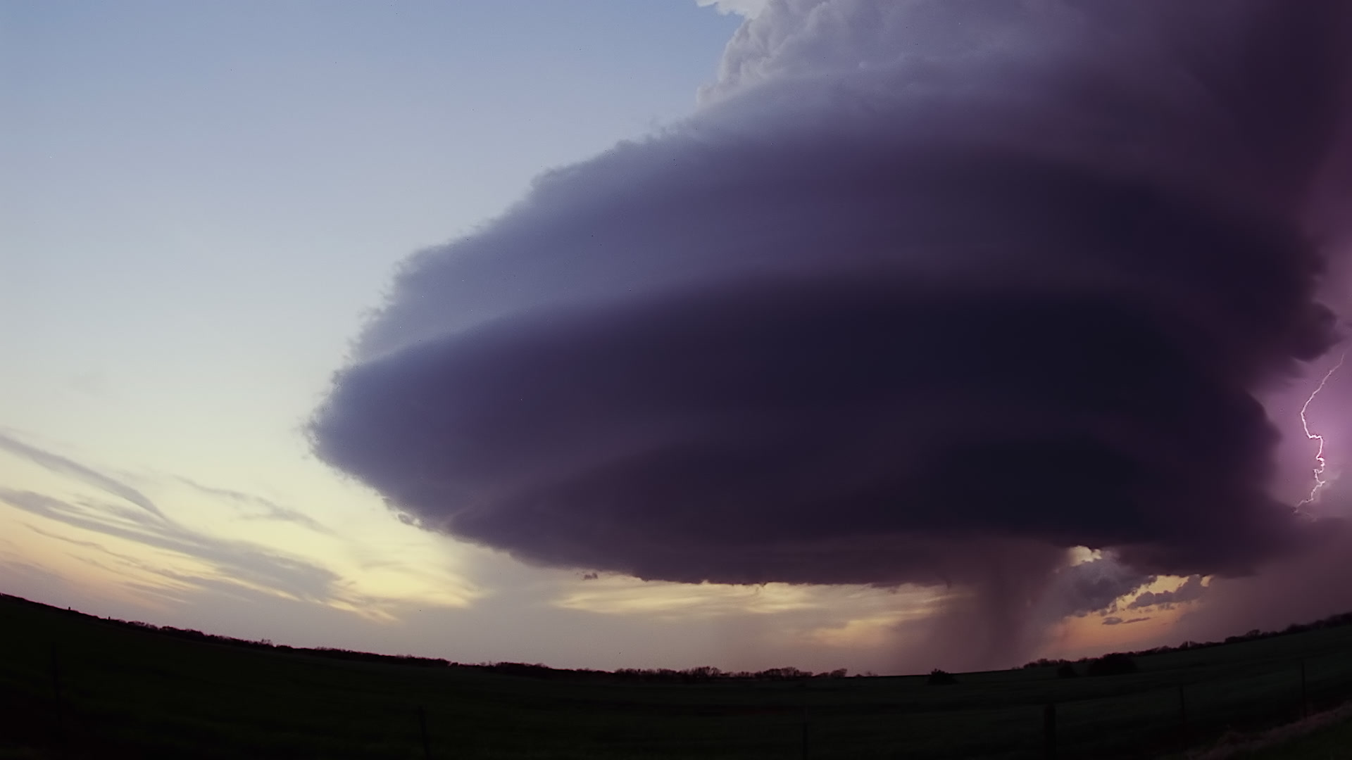 Storms on 35 - Flying saucer supercell approaches at dusk, Windthorst. Super 35mm film to 4K video. Cinematographer: Martin Lisius. Need more? Give us a shout!