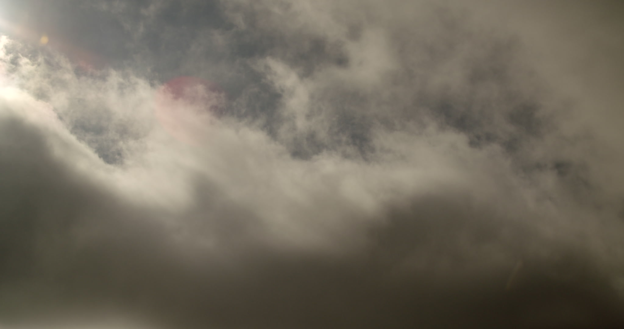 4K Storm Clouds - Golden, sunlight stratus clouds drift by. Cinematographer: Martin Lisius.
