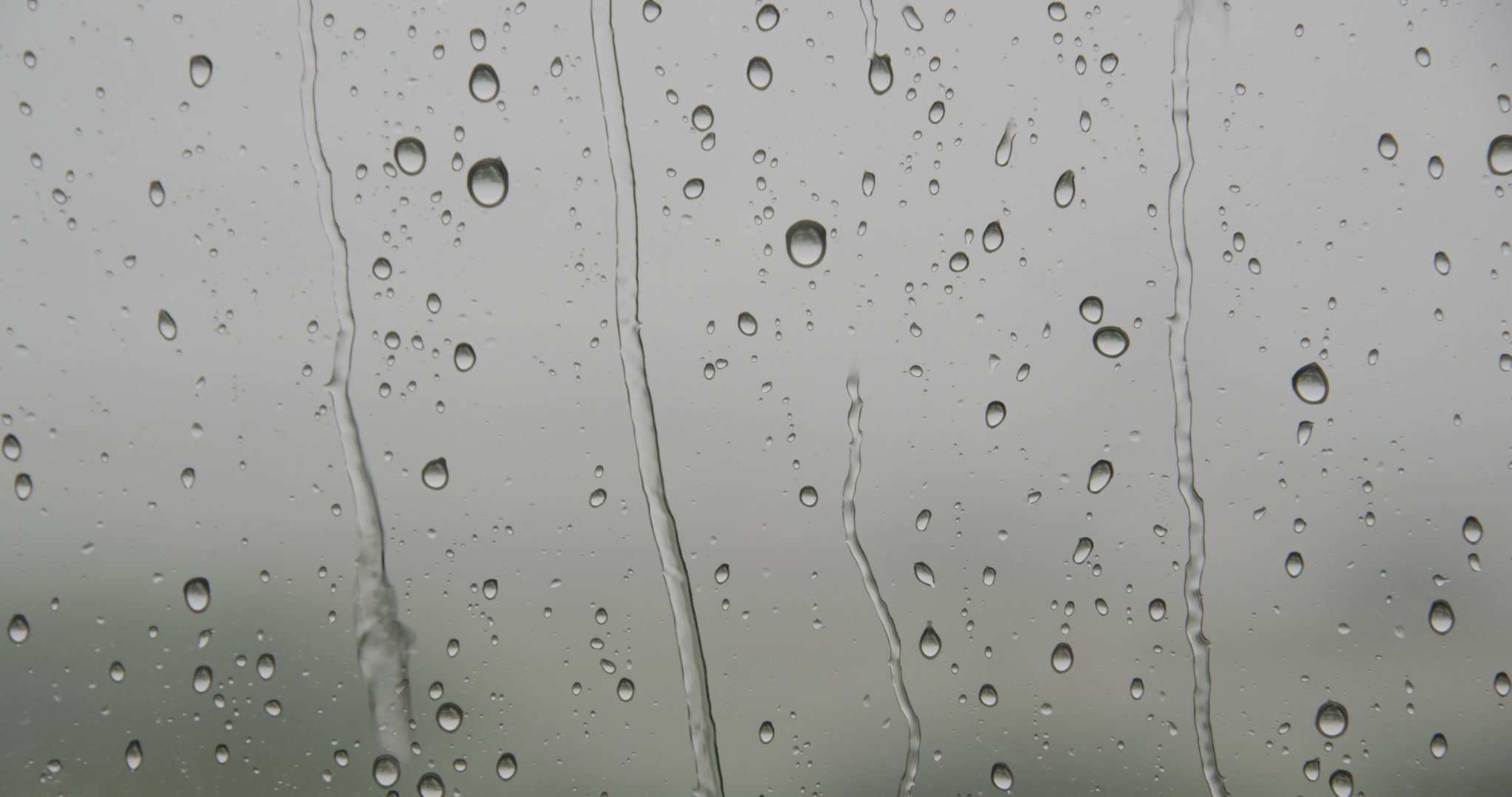 Rain storm - rain drops run down window, DCI 4K.