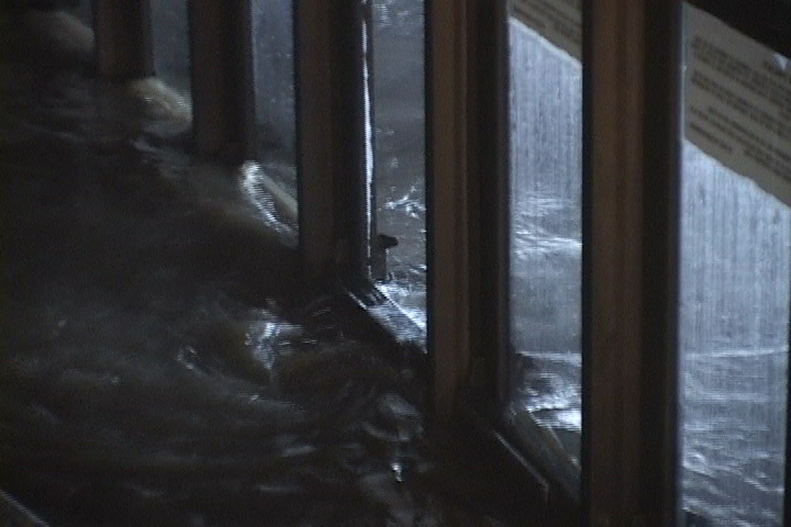 Storm surge flows into building, Hurricane Katrina.