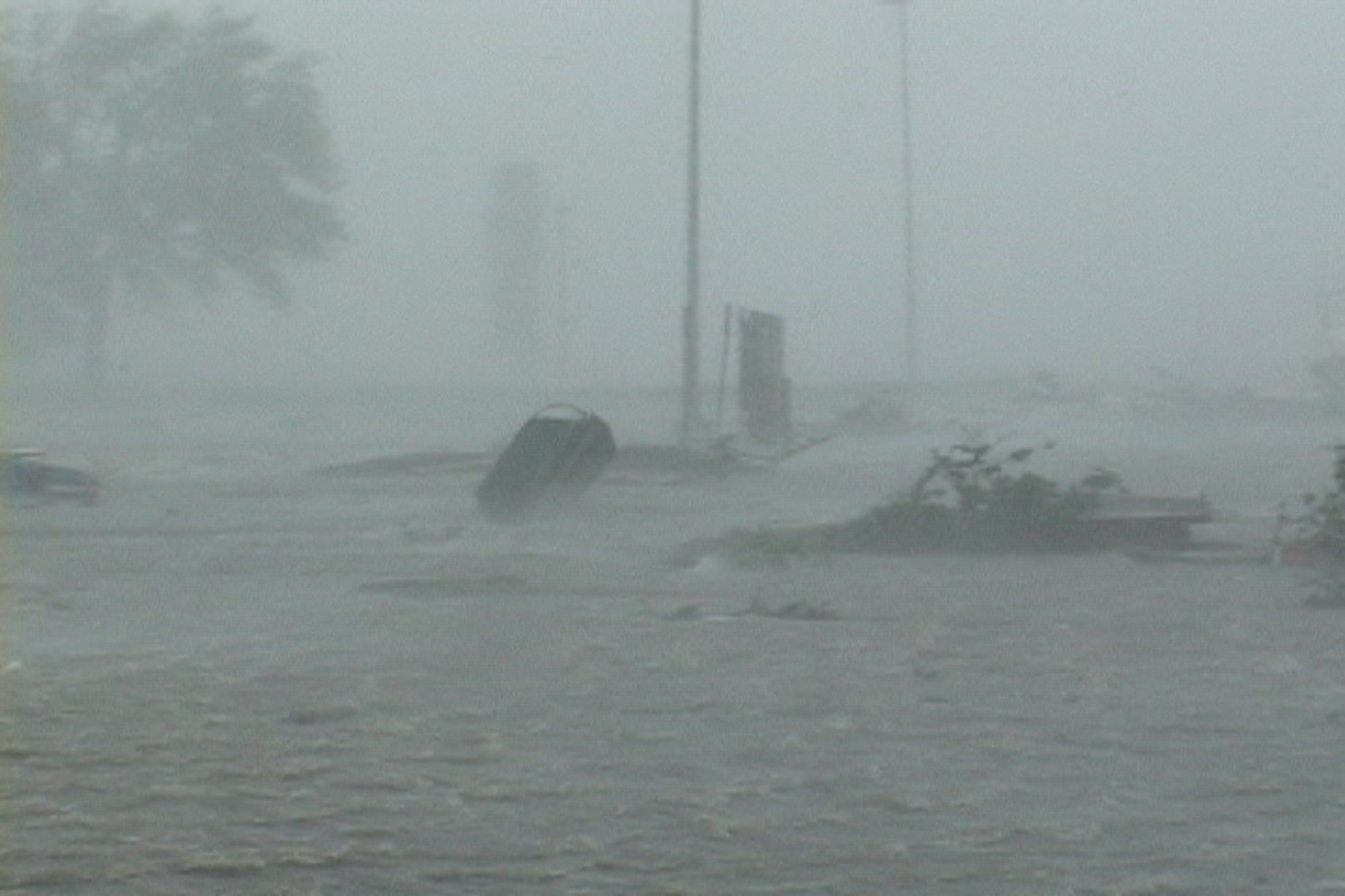 Small boat floats inland, storm surge, Hurricane Katrina.