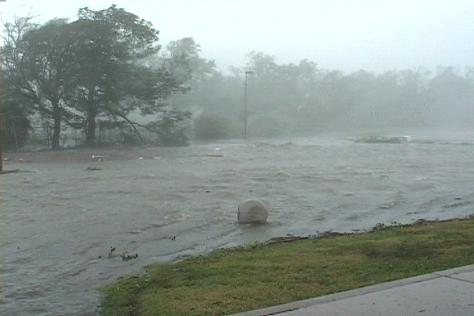 Storm surge pushes debris inland, Hurricane Katrina.