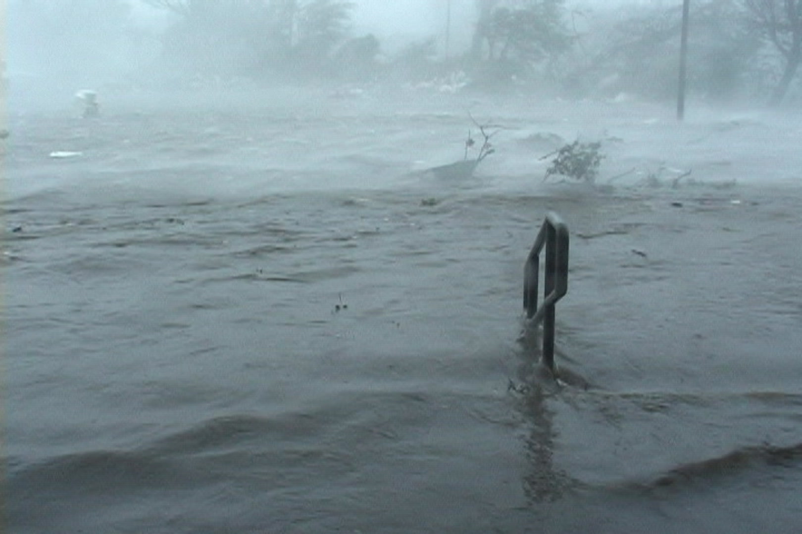 Storm surge, waves roll over everything as Hurricane Katrina intensifies.