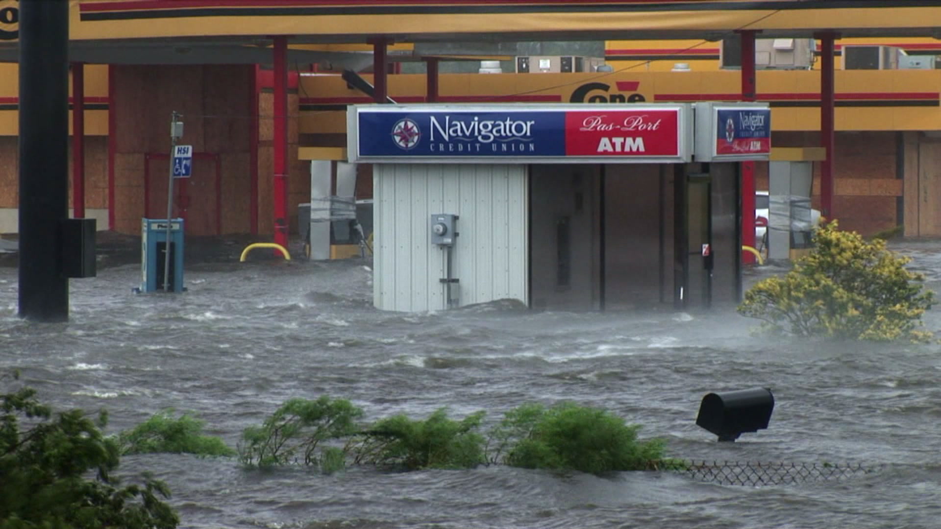 ATM and gas station flooding in storm surge, Hurricane Katrina, 4K video. Cinematographer: Martin Lisius.