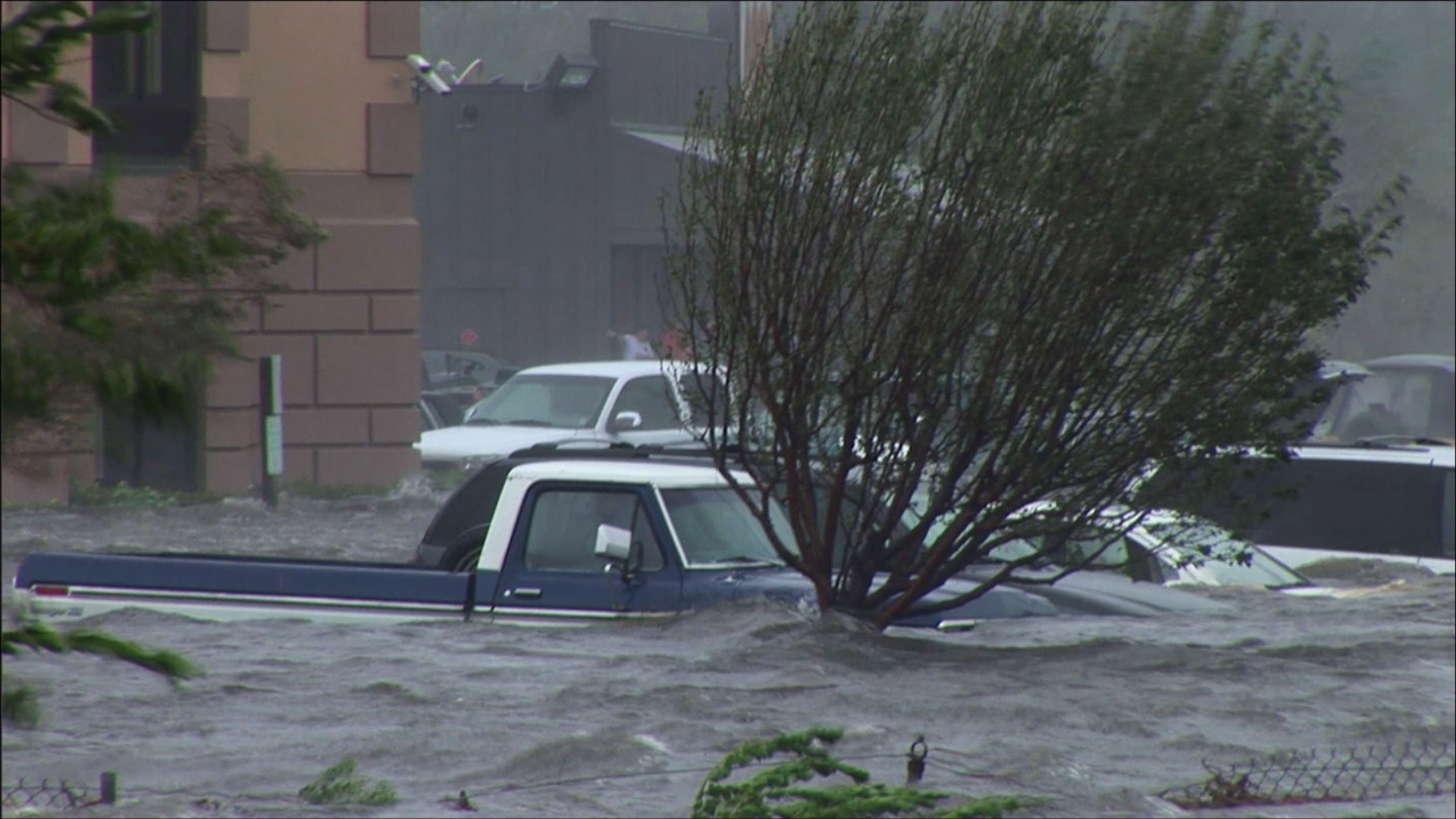 Pickup truck, cars caught in storm surge, Hurricane Katrina, 4K video. Cinematographer: Martin Lisius.