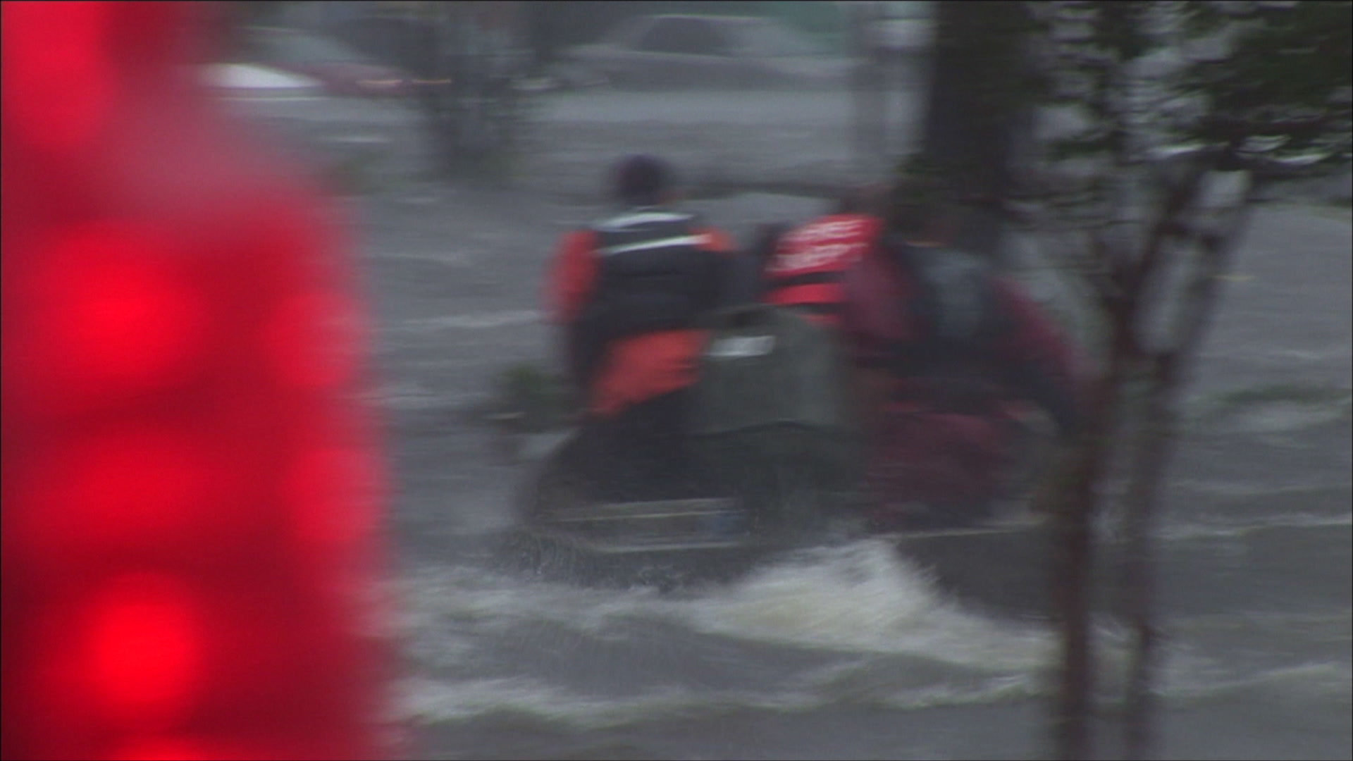 High water rescue team passes nearby, Hurricane Katrina, 4K. Cinematographer: Martin Lisius.