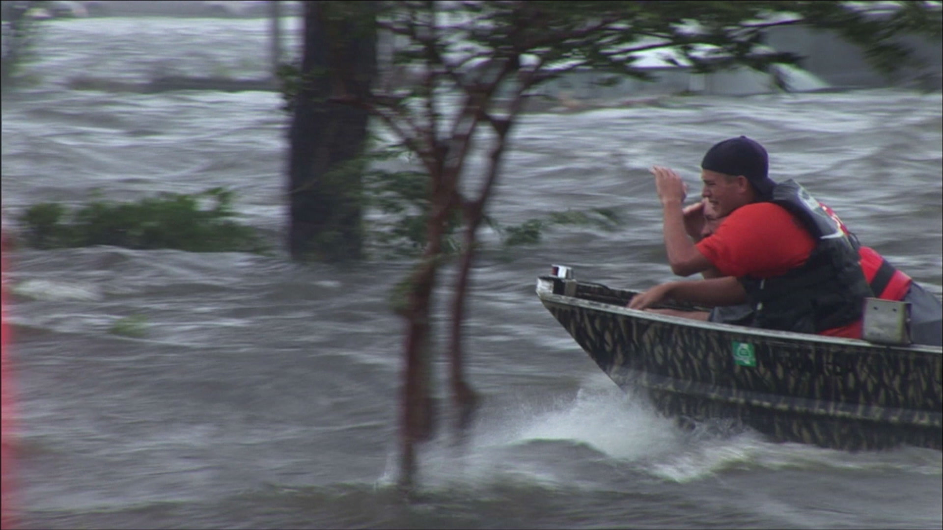 Searching for victims in flooded parking lot, high water rescue team, Hurricane Katrina, 4K. Cinematographer: Martin Lisius.