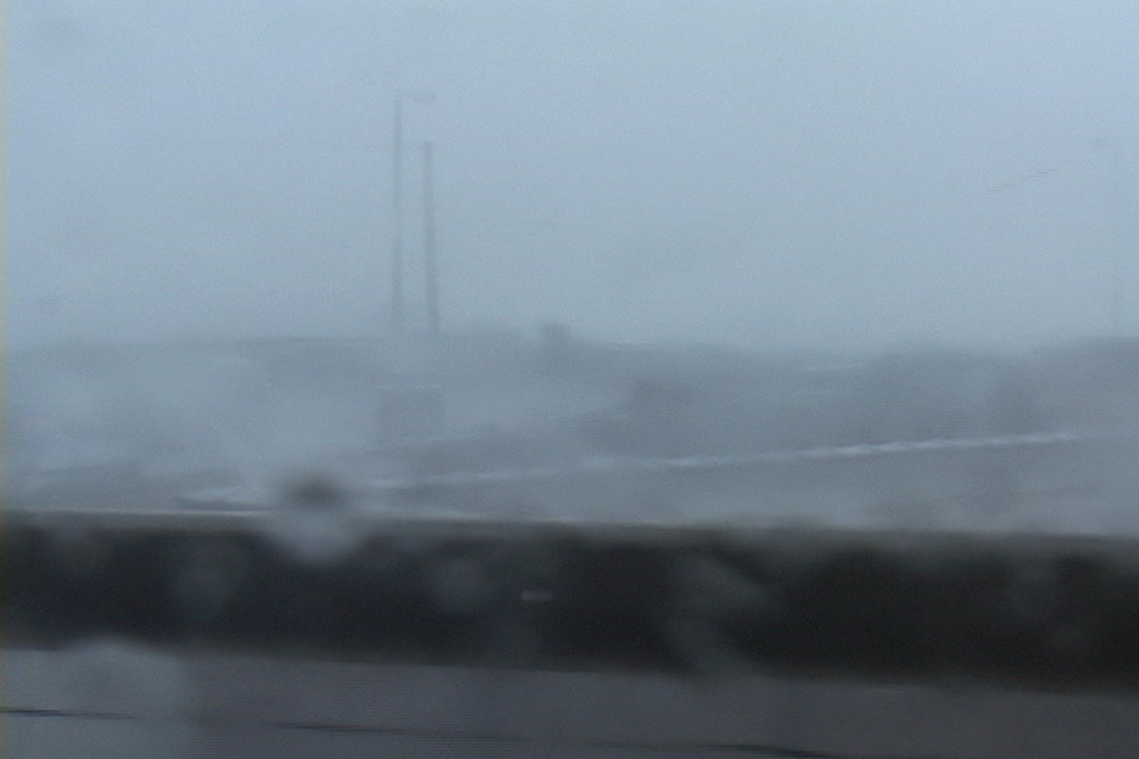 Intense wind and rain blow across top of city, Hurricane Katrina.