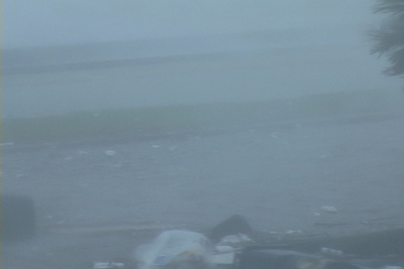 Debris floats by during Hurricane Katrina.