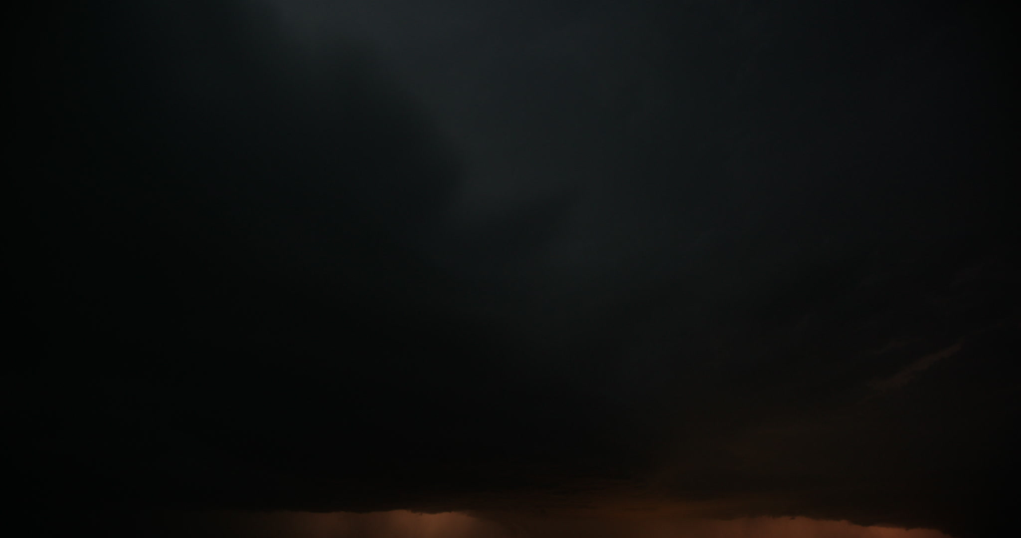 Lightning flashes between two storms, night, time-lapse, Nebraska, 4K. Cinematographer: Martin Lisius. Camera: RED DSMC Dragon 5K.