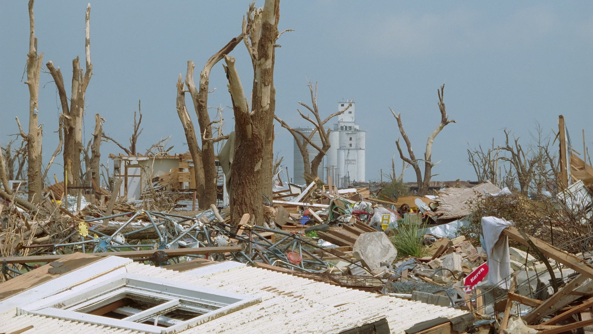 Tornado damage and aftermath - debris and grain elevator, Greensburg EF5 aftermath, 35mm film to 4K.