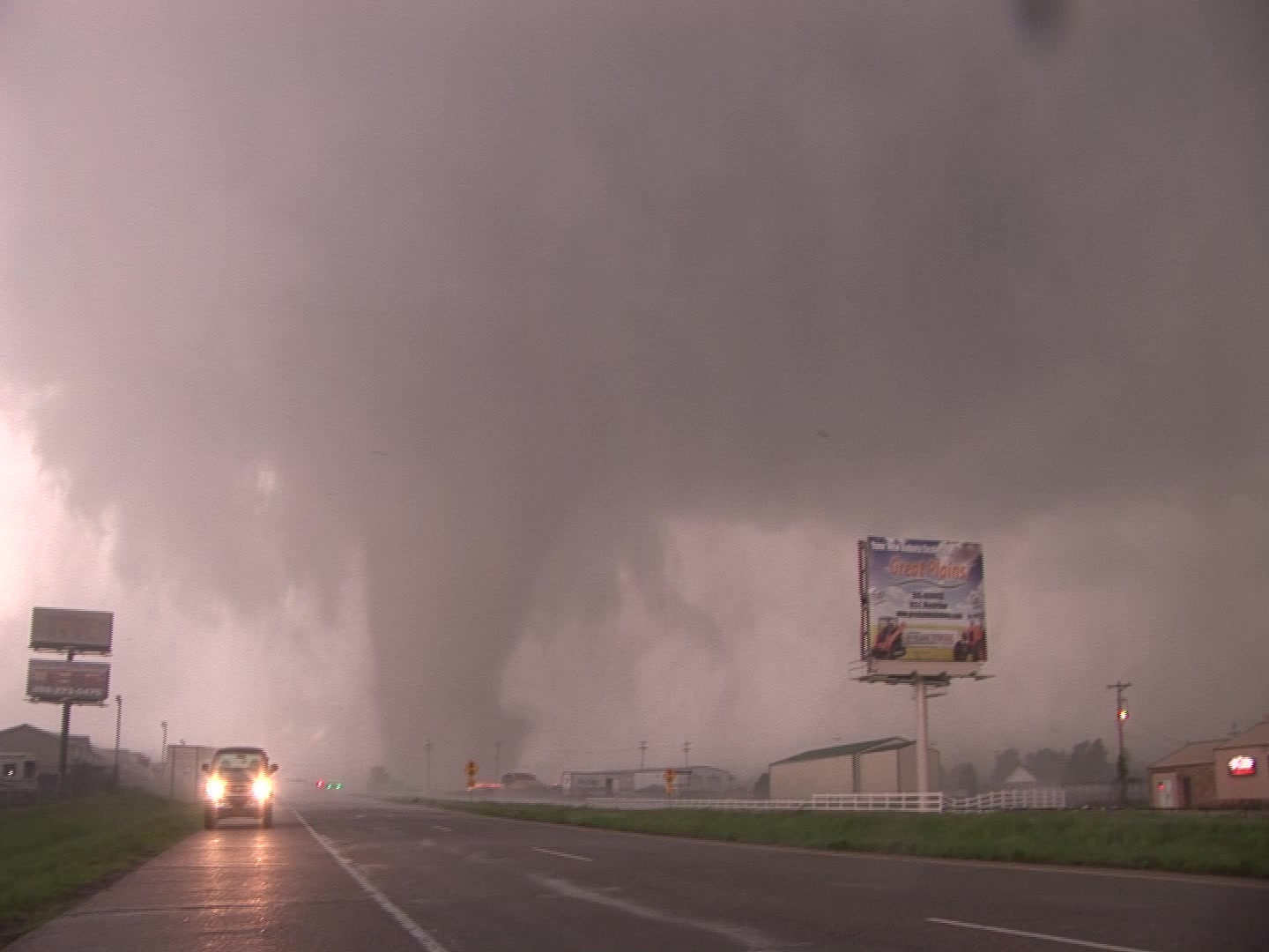Large, destructive tornado moves into city, Oklahoma.