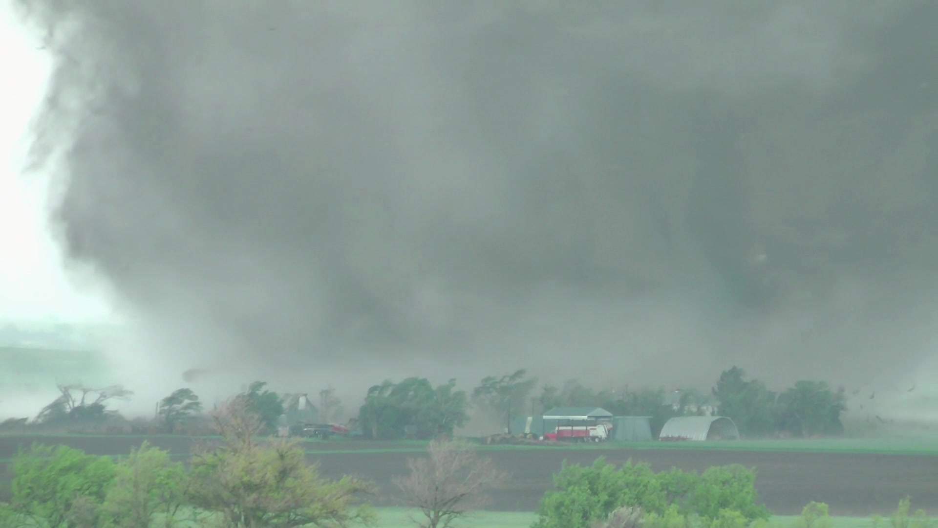 Tornado destroys farm, lightning and thunder blast, Kansas.