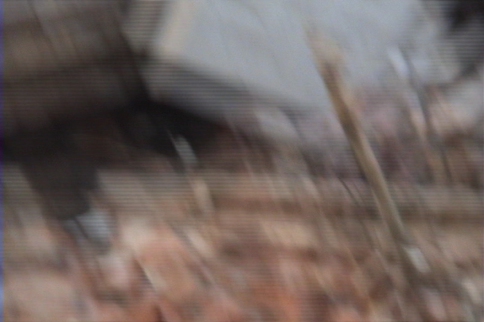 Tornado damage and aftermath - Woman crying in window, Woodward, Iowa.