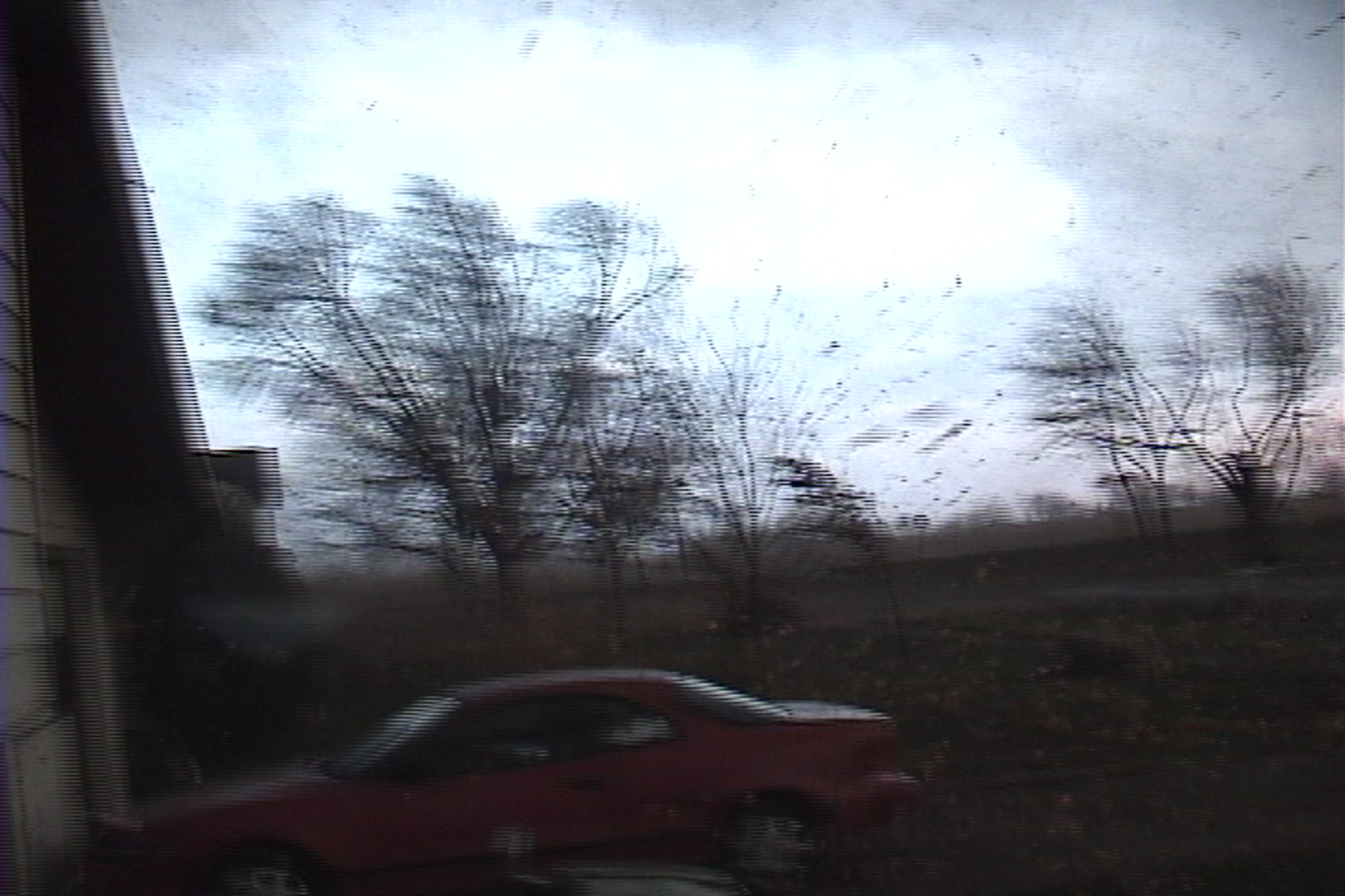 Tornado moves into yard and behind house, Woodward, Iowa.