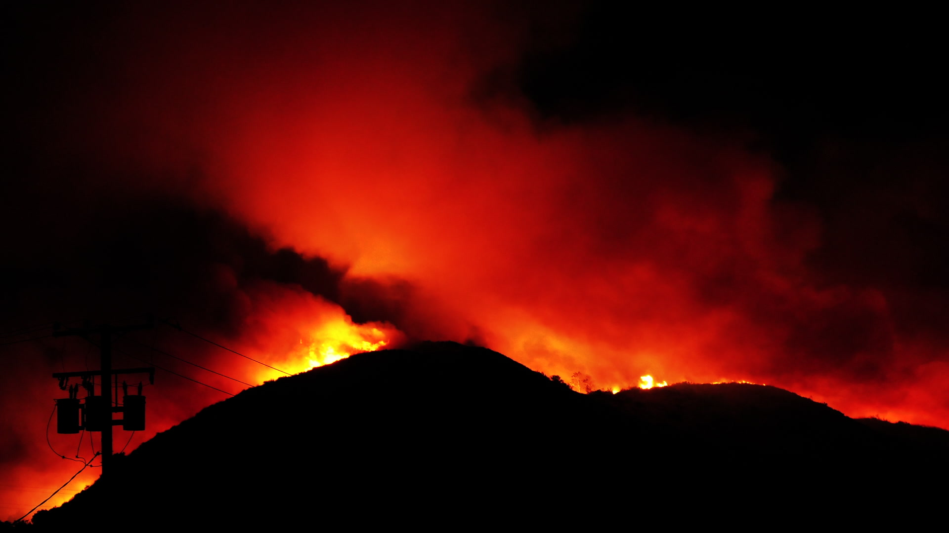 Intense fire glows red at night - The Thomas Fire, California, 2017, 4K.